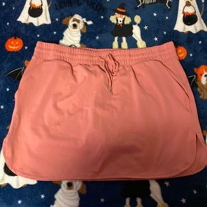 Salmon tennis skort.